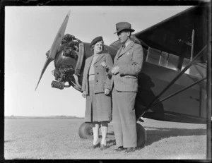 HT Morton, and his sister, standing alongside a monoplane, Mangere, Auckland
