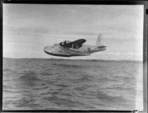 Short Sunderland seaplane, Tainui, taking off from Mechanics Bay, Auckland