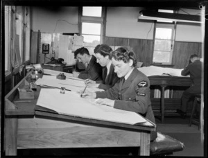View of unidentified WAAF and RNZAF airmen Meteorological Section staff members at work at their drawing boards, Mechanics Bay, Auckland City