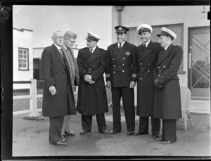 Group unidentified portrait of passengers off a TEA Tasman Flying Boat at Mechanic's Bay, including TEA Captains A V Jury and D Phillips, Auckland City