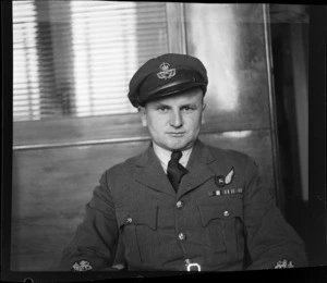 Portrait of Wing Officer K T [Guttrell?] RNZAF of Whenuapai Airfield in uniform, Whites Aviation Office, Auckland City