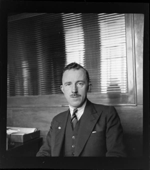 Portrait of L E Clark of representative for Percival Aircraft, Whites Aviation Office, Auckland City