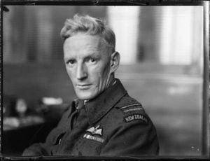 Portrait of Flight Lieutenant H W Wrennall of RNZAF in uniform, Whites Aviation Office, Auckland City