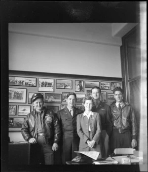 Portrait of the USAAF Mitchell record breaking flight crew (L to R) Sgt Thomas Petty, Lt James Lowe, Pamela Haddock, Lt W E Studebaker and James Huntes, Whites Aviation Office, Auckland City