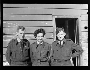Two unidentified men [Wood] and one woman, Transport Section, Royal New Zealand Airforce [Whenuapai]