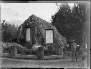 Unidentified man standing next to the Memorial to Robert Falcon Scott, Queenstown Gardens, Queenstown