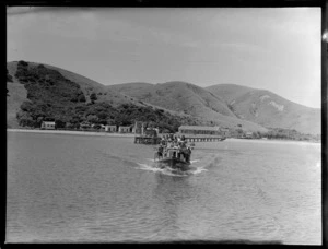 Passengers leaving Otehei Bay, Bay of Islands, aboard the 'Knoxie'