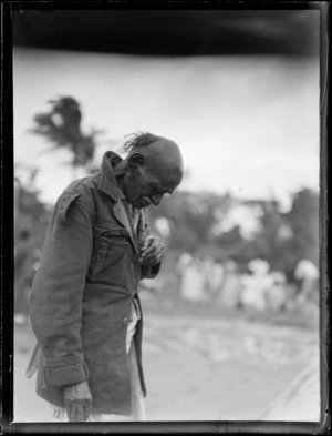 An unidentified Fijian man, wearing a military jacket, Suva, Fiji