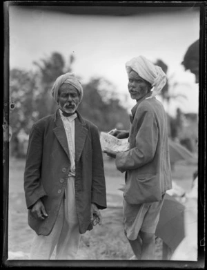 Two unidentified men at a outdoor market, Suva, Fiji