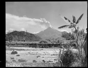 View across a valley stream to the erupting volcano of Mount Bagana, Bougainville Island, North Solomon Island group