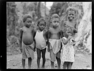 Portrait of young Bougainville Island children on a pathway through the jungle, North Solomon Island group