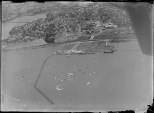 View of Mechanic's Bay Seaplane Base and a moored flying boat amongst local yachts and boats, with Tamaki Drive and Parnell beyond, Auckland Harbour