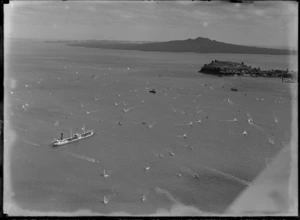 View of a yacht race on Auckland Harbour with Northhead and Rangitoto Island beyond