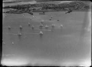 View of a yacht race on Auckland Harbour with Devonport beyond