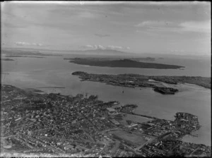 Auckland City and wharves, showing Rangitoto Island in the background