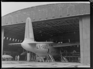 Three quarter view of a Short Tasman aircraft, in a hangar, Hobsonville, Auckland