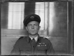Portrait of Flying Officer C D J Regan in uniform, 5th F/B Squadron RNZAF, Whites Aviation Office, Auckland City