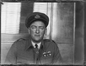 Portrait of Flight Lieutenant P J Wannes in uniform, 5th F/B Squadron RNZAF, Whites Aviation Office, Auckland City