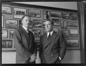 Portrait of (L to R) E A Robinson (Whites) and J Mollison, Whites Aviation Office, Auckland City