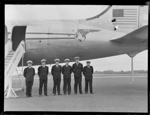 Crew, all unidentified, of Pan American World Airways Clipper 'Malay', at an unidentified aerodrome