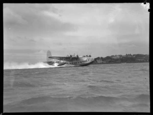 Flying boat, Short New Zealand, taking off at Mechanics Bay, Auckland