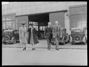 An unidentified woman, far left, with, from left to right; Lady Duff, Sir Patrick Duff, and George Bolt, at an unidentified location, probably an aero club or aerodrome