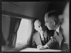 Sir Patrick Duff and John C Allum, Mayor of Auckland, aboard an aeroplane