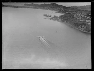 View of the Imperial Airways Flying Boat 'Centaurus' landing on Evans Bay, Wellington Harbour