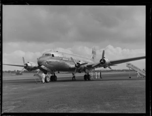 The arrival of Pan American Airways NC-88888 Clipper Class 'East India' passenger plane with unidentified ground personnel, Whenuapai Airfield, Auckland