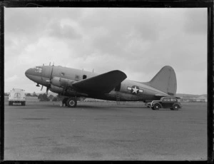View of an American Army Curtis R5C-1 Commando (C-46) transport plane on the runway, Whenuapai Airfield, Auckland