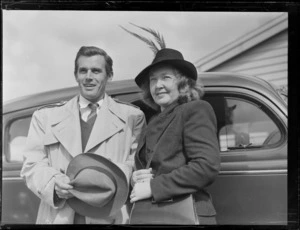 Portrait of Mr F Parker a USA Davis Cup Player and Mrs Parker in front of a car, [Auckland?]