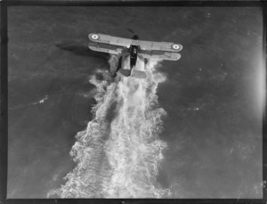 RNZAF (Royal New Zealand Air Force) aircraft Fairey IIIF flying boat, taxiing along the ocean, location unknown
