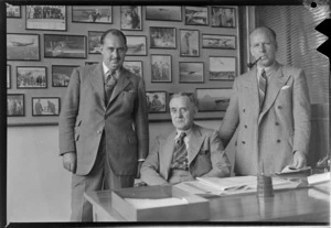 Group portrait of (L to R) Mr Puddicombe, Sir J Buchannan and Mr Hambrook, Whites Aviation Office, Auckland City