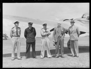 Officials in front of NAC (National Airways Corporation) mail plane 'Kahu' for the opening ceremony of the Northland Air Service at Onerahi Airport, Whangarei, Northland