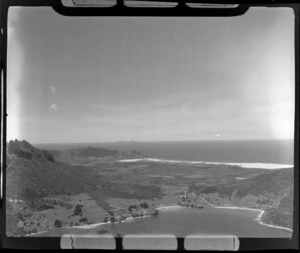 Taurikura Bay and settlement with Mt Manaia, with Ocean Beach beyond, Whangarei Heads, Northland Region