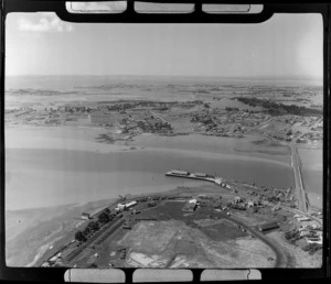 Mangere Bridge and Gloucester Reserve with [military camp?] and the Manukau Harbour, looking north to Mangere Domain, Onehunga, Auckland City