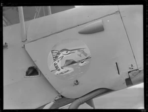 Close-up view of the Tiger Moth ZK-AJT 'Tauranga A/C' marlin aeroplane insignia, Mangere Airport, Auckland