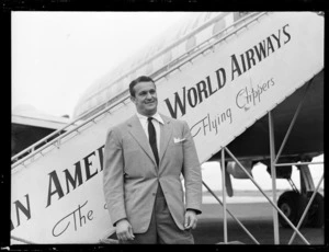 Mr Al Hershey, American athlete, standing next to PAWA (Pan American World Airways) clipper