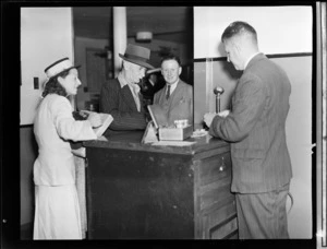 Passengers changing their currency at TEA (Tasman Empire Airways) office, Auckland