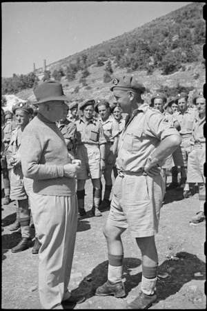 Prime Minister Peter Fraser talks with a friend while touring New Zealand troops on the Italian Front, World War II - Photograph taken by George Bull