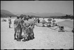 Prime Minister Peter Fraser visits waterpoint during tour of NZ troops in the Volturno Valley area, Italy, World War II - Photograph taken by George Bull