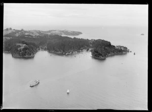 Mansion House Bay and Governor Grey's residence with a jetty and yachts moored in cove, western end of Kawau Island, Auckland Region