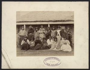 Group of women and children at whare komiti, Haerehuka