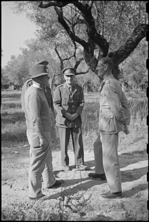 Prime Minister Peter Fraser with Generals Freyberg, Puttick and Lieutenant General Sir Richard McCreery in Italy, World War II - Photograph taken by George Bull