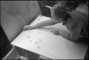 B R Renton on a concentration board at 2 NZ Division Flash-spotting unit in the Cassino area, Italy, World War II - Photograph taken by George Kaye