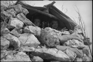 Two members of Divisional Flash-spotting troop in forward observation post near Cassino, Italy, World War II - Photograph taken by George Kaye