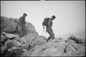 E G Wilson and J A Batty returning from a forward flash-spotting observation post in the Cassino area, Italy, World War II - Photograph taken by George Kaye