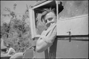 T W Howden among New Zealanders following retreating German forces on the Italian Front, World War II - Photograph taken by George Kaye