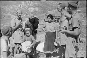 New Zealand soldiers talking to refugees near Atina, Italy, World War II - Photograph taken by George Kaye