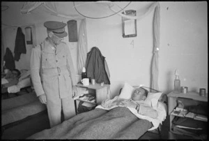 Lieutenant General Edward Puttick speaks with R J Arney at 2 NZ General Hospital, Caserta, Italy, World War II - Photograph taken by George Kaye